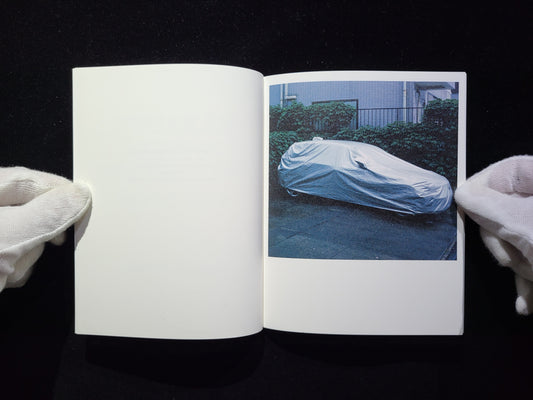 VARIOUS COVERED AUTOMOBILES AND SNOW  Takashi Homma